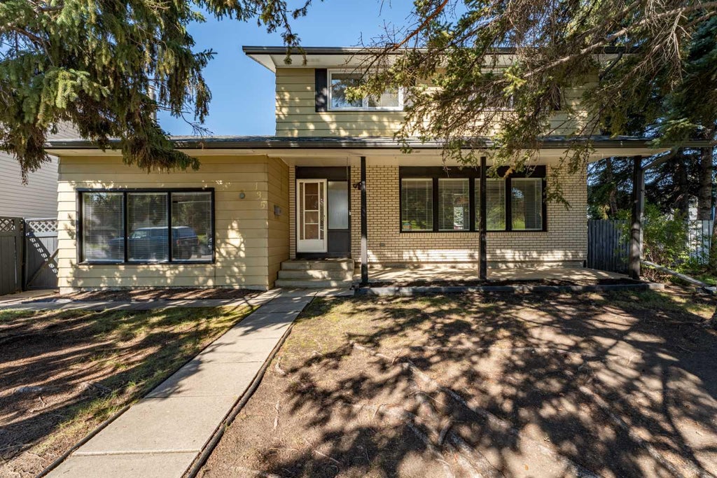 Photo of 135 Queensland Road SE, Calgary, AB T2J 3R9 (MLS # A2344234)