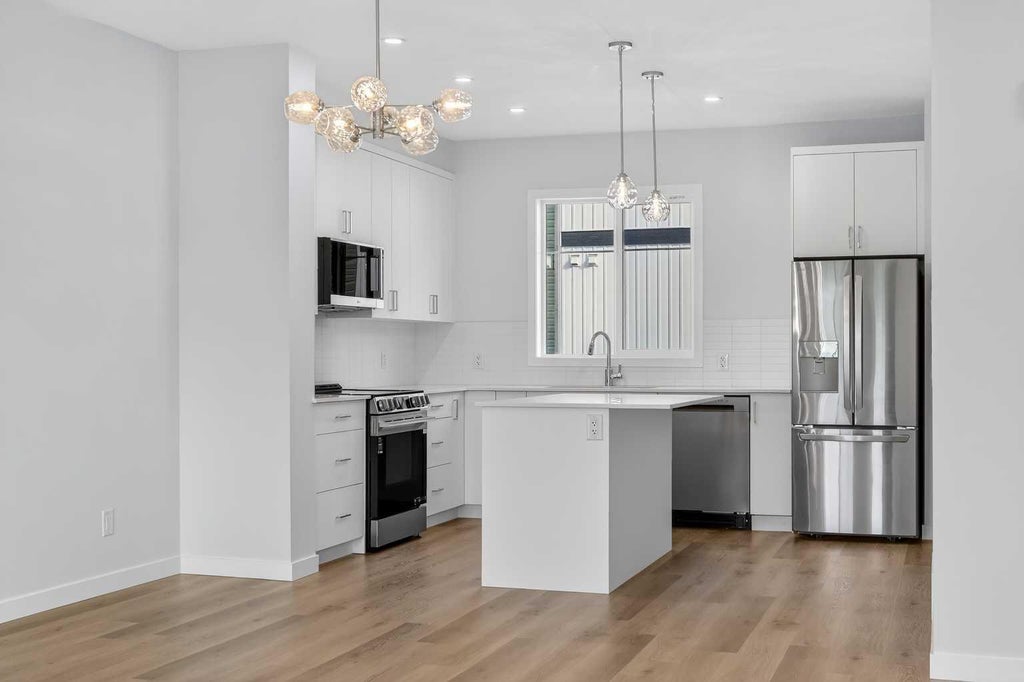 Photo of 30 Creekside Avenue SW, Calgary, AB T2X 6E2 (MLS # A2351021)