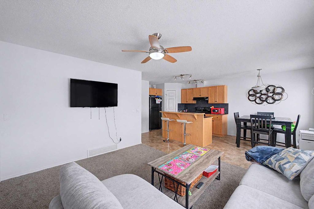 Photo of 800 Yankee Valley Boulevard SE #102, Airdrie, AB T4A 2L1 (MLS # A2329188)