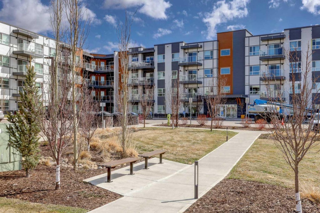Photo of 360 Harvest Hills Way NE #106, Calgary, AB T3K 2S1 (MLS # A2348147)