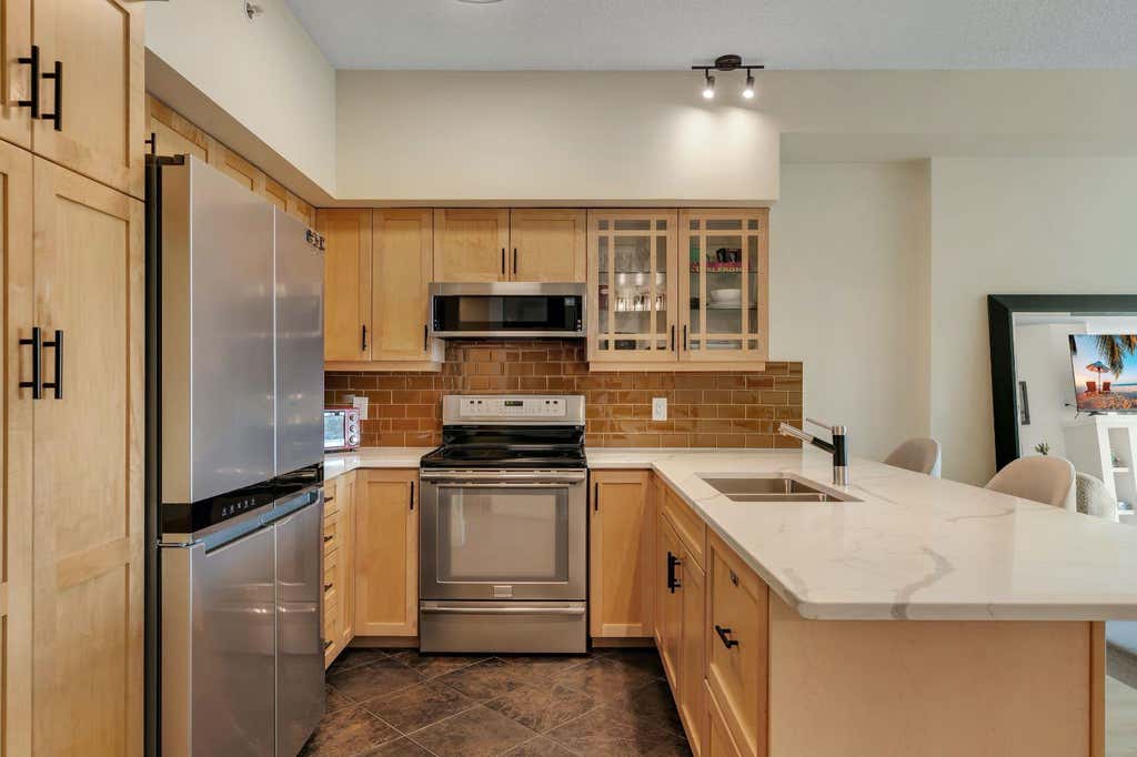 Photo of 205 Riverfront Avenue SW #604, Calgary, AB T2P 5K4 (MLS # A2335934)