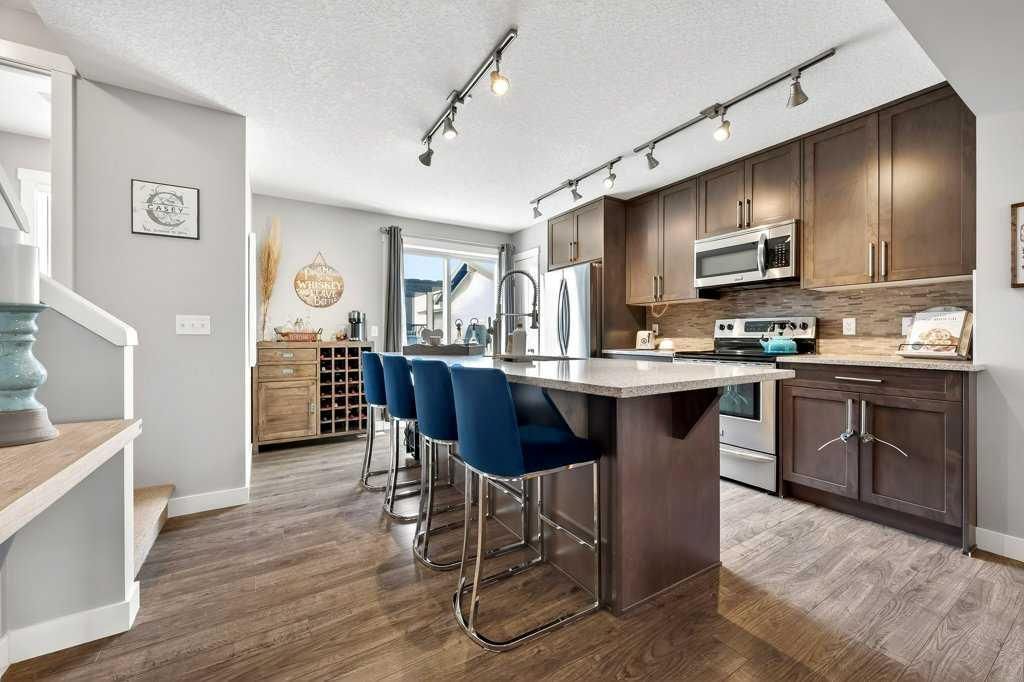 Photo of 207 Cranford Walk SE, Calgary, AB T3M 1R6 (MLS # A2293831)