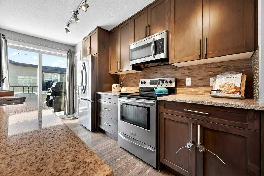 Photo of 207 Cranford Walk SE, Calgary, AB T3M 1R6 (MLS # A2293831)