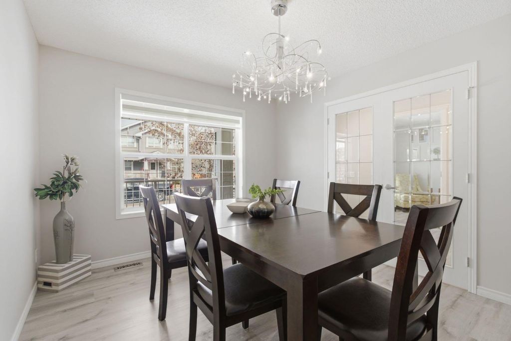 Photo of 124 Prestwick Estate Way SE, Calgary, AB T2Z 3M2 (MLS # A2293077)