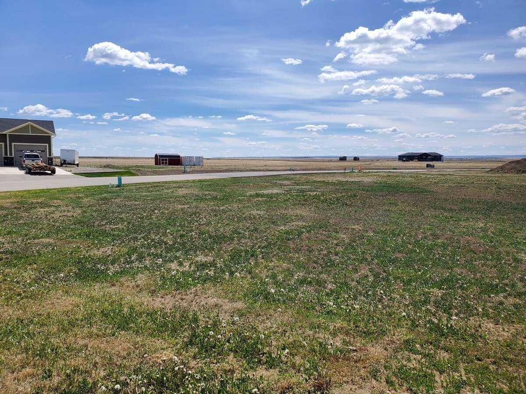 Photo of 42 Pebble Creek Cove, Raymond, AB T0K 2S0 (MLS # A2291512)