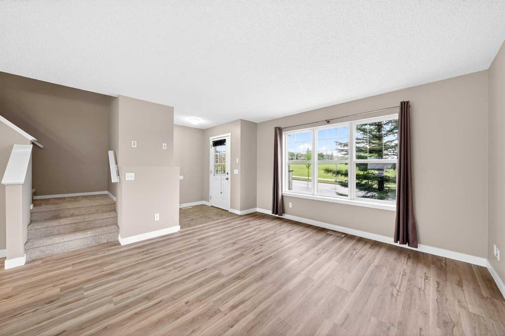 Photo of 928 Panamount Boulevard NW, Calgary, AB T3K 0P4 (MLS # A2316867)