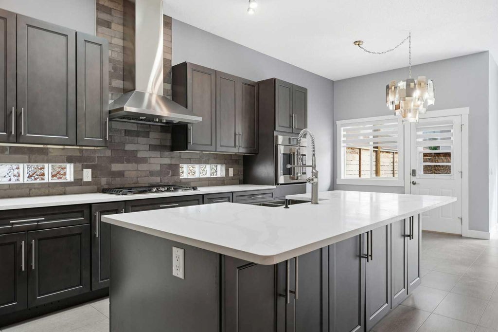 Photo of 209 Oakmere Close, Chestermere, AB T1X 1L1 (MLS # A2350027)