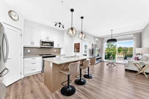 Photo of 10 Walgrove Walk SE #120, Calgary, AB T2X 4E3 (MLS # A2335074)