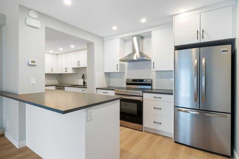 Photo of 4915 45 Street SW #11, Calgary, AB T3E 3W5 (MLS # A2300746)