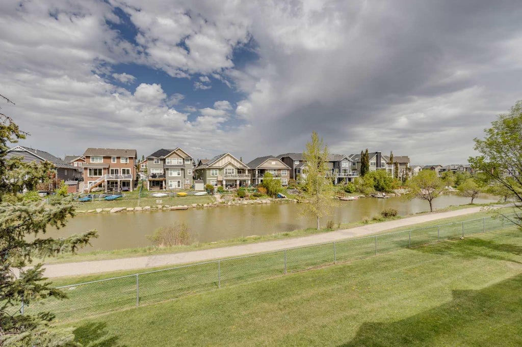 Photo of 212 Bayside Point SW, Airdrie, AB T4B 2X6 (MLS # A2329995)