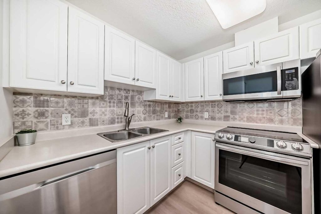 Photo of 5000 Somervale Court SW #412, Calgary, AB T2Y 4M1 (MLS # A2314389)