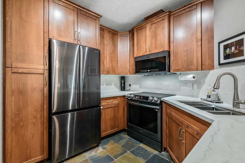 Photo of 20 Discovery Ridge Close SW #233, Calgary, AB T3H 5X4 (MLS # A2327336)
