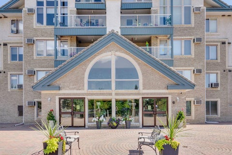Photo of 7239 Sierra Morena Boulevard SW #107, Calgary, AB T3H 3L7 (MLS # A2349309)