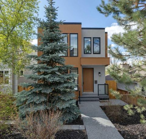 Photo of 911 Drury Avenue NE, Calgary, AB T2E 0M3 (MLS # A2310913)
