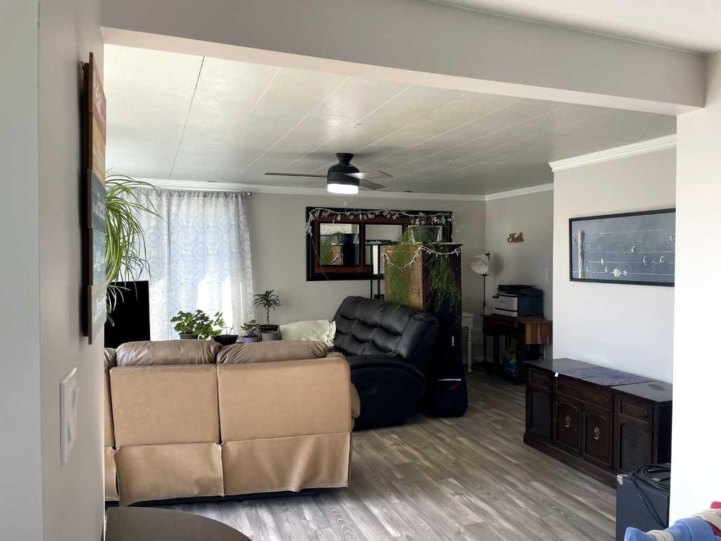 Photo of 10106 99 Street, High Level, AB T0H 1Z0 (MLS # A2342859)