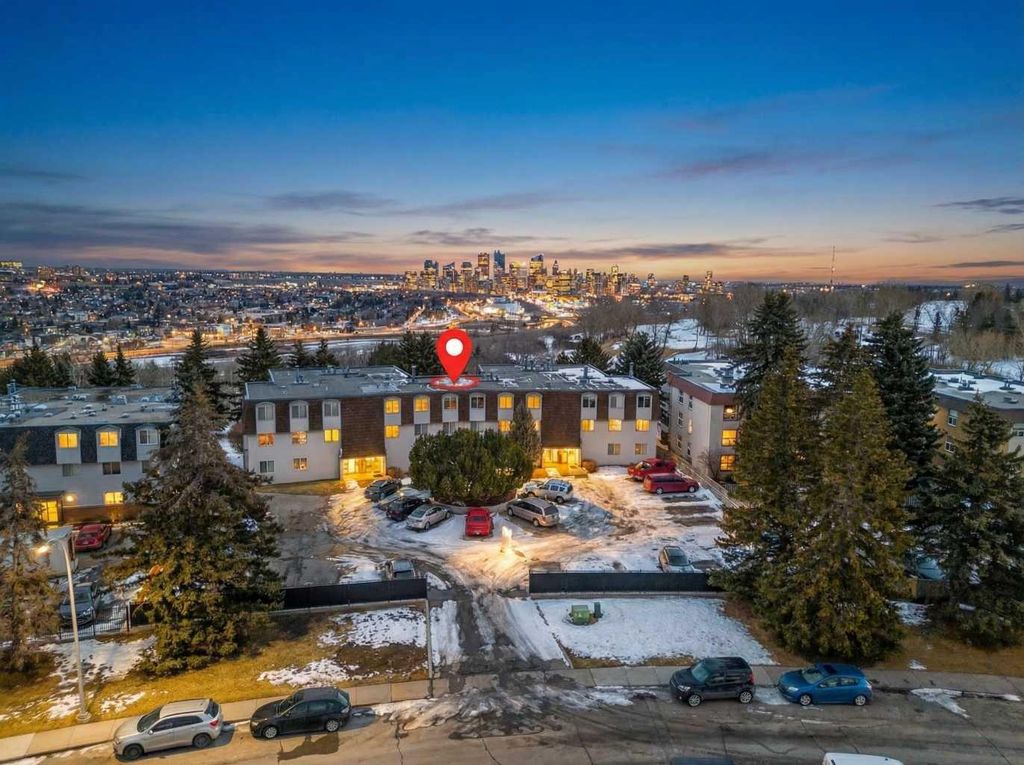 Photo of 512 Cedar Crescent SW #304, Calgary, AB T3C 2Y8 (MLS # A2292157)