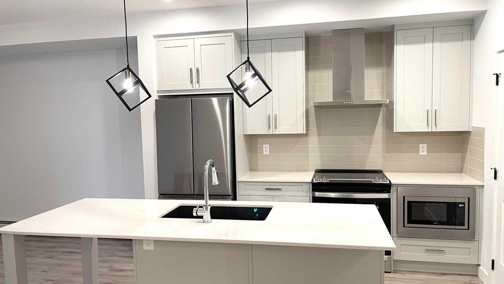Photo of 40 Sage Hill Cmn NW #115, Calgary, AB T3R 2C5 (MLS # A2330577)