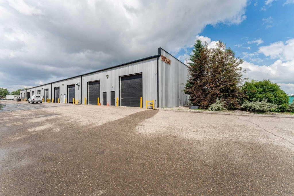 Photo of 235105 Wrangler Drive SE #10, Rural Rocky View County, AB T2P 2G6 (MLS # A2321019)
