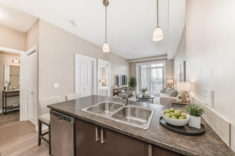 Photo of 117 Copperpond Common SE #311, Calgary, AB T2Z 5E6 (MLS # A2344426)