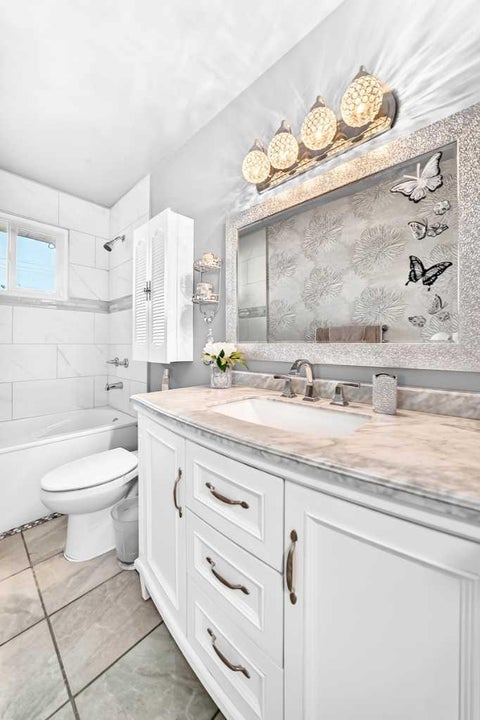 Tiny photo for 165 Marbrooke Circle NE, Calgary, AB T2A 2W4 (MLS # A2347281)