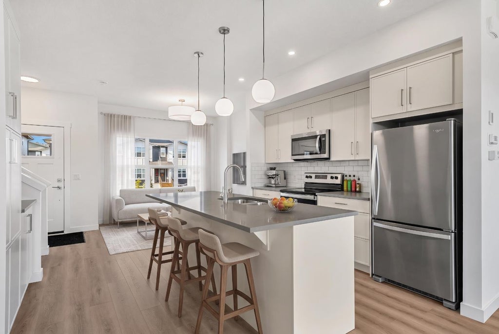 Photo of 525 River Heights Drive #1505, Cochrane, AB T4C 3E4 (MLS # A2354165)