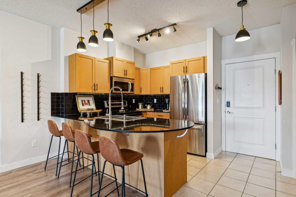 Photo of 11811 Lake Fraser Drive SE #4604, Calgary, AB T2J 7J4 (MLS # A2288941)