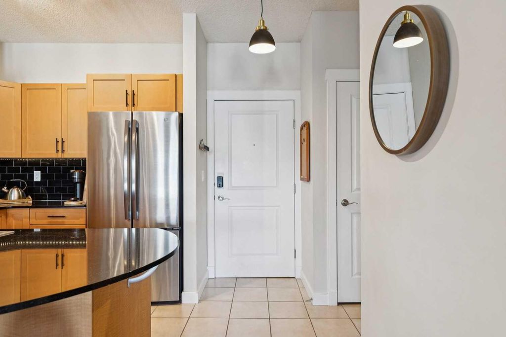 Photo of 11811 Lake Fraser Drive SE #4604, Calgary, AB T2J 7J4 (MLS # A2288941)