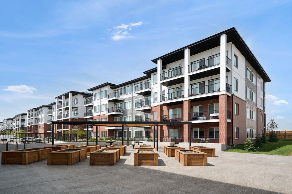 Photo of 6 Merganser Drive W #4313, Chestermere, AB T1X 2Y2 (MLS # A2305460)