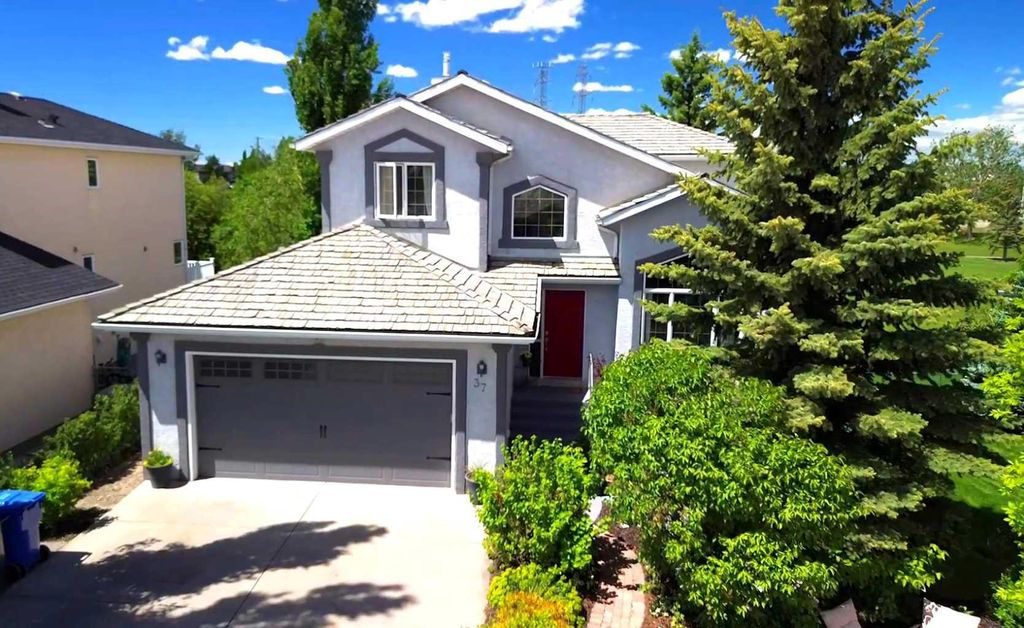 Photo of 37 LAKESIDE GREENS Close, Chestermere, AB T1X 1C2 (MLS # A2314787)