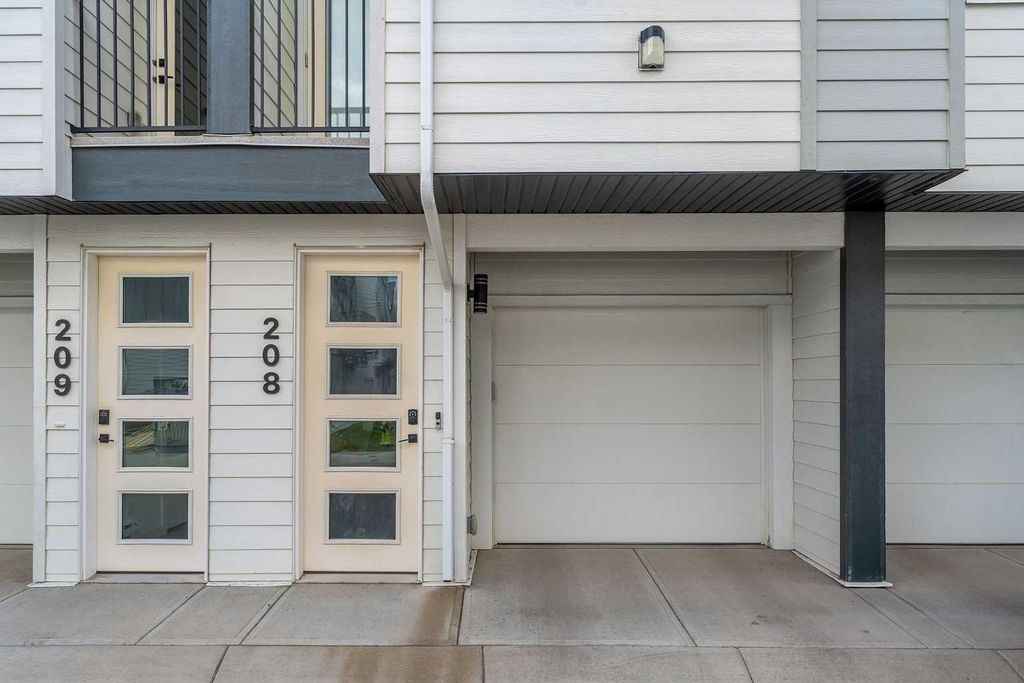 Photo of 101 Panatella Square NW #208, Calgary, AB T3K 2R9 (MLS # A2319096)