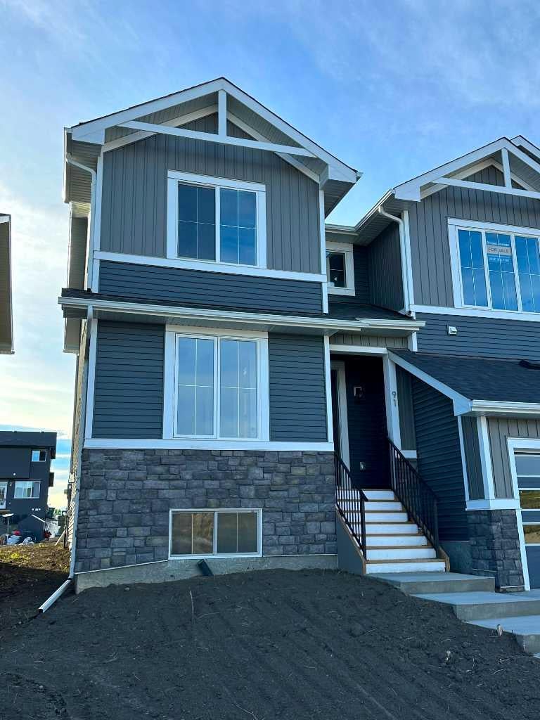 Photo of 91 Agate Road, Cochrane, AB T4C 3B9 (MLS # A2344149)