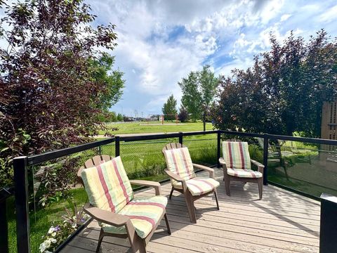 Photo of 133 Channelside Cove SW, Airdrie, AB T4B 2J1 (MLS # A2329106)