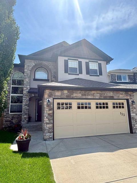 Photo of 133 Channelside Cove SW, Airdrie, AB T4B 2J1 (MLS # A2329106)