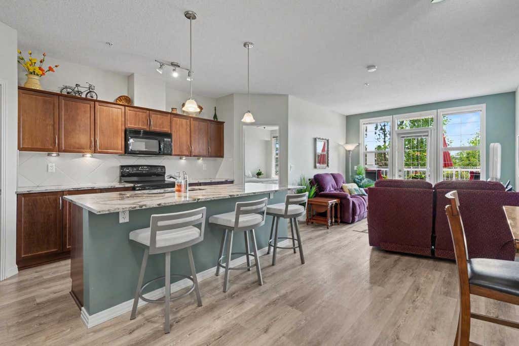Photo of 1 Crystal Green Ln #116, Okotoks, AB T1S 0C5 (MLS # A2340505)
