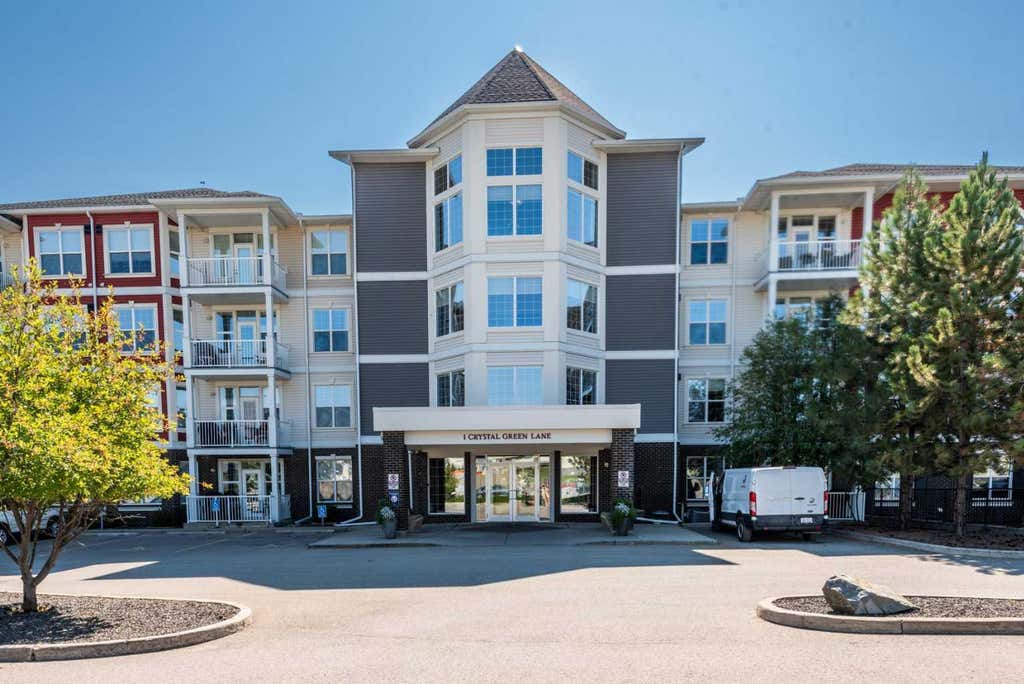 Photo of 1 Crystal Green Ln #116, Okotoks, AB T1S 0C5 (MLS # A2340505)