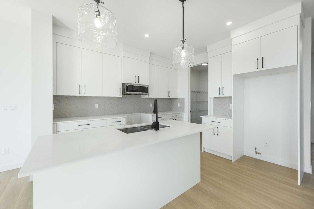 Photo of 96 Heritage Manor, Cochrane, AB T4C 3K8 (MLS # A2322893)