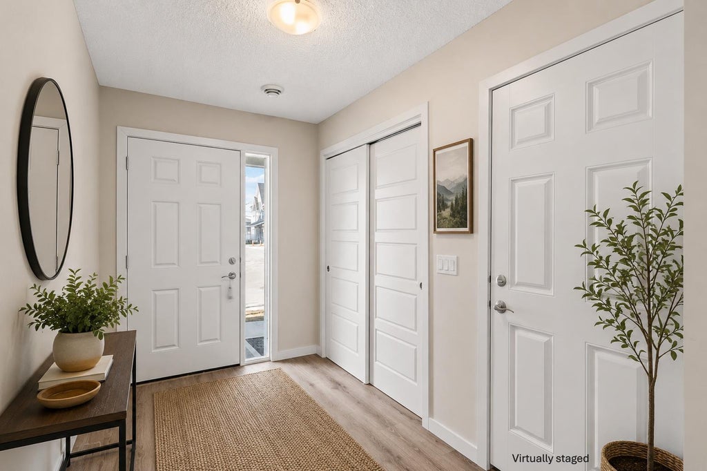 Photo of 32 Red Embers Parade NE #310, Calgary, AB T3N 1P7 (MLS # A2348104)
