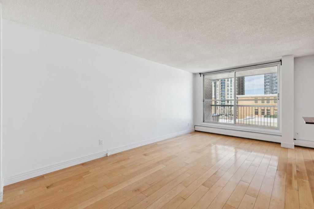 Photo of 1123 13 Avenue SW #509, Calgary, AB T2R 0L7 (MLS # A2296973)