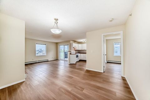 Photo of 2280 68 Street NE #1302, Calgary, AB T1Y 7M1 (MLS # A2311215)