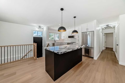 Photo of 4020 Varsity Drive NW, Calgary, AB T3A 0Z6 (MLS # A2257951) Photo of 4020 Varsity Drive NW, Calgary, AB T3A 0Z6 (MLS # A2257951)