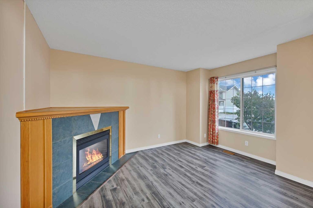 Photo of 54 MARTINRIDGE Road NE, Calgary, AB T3J 3N9 (MLS # A2335190)