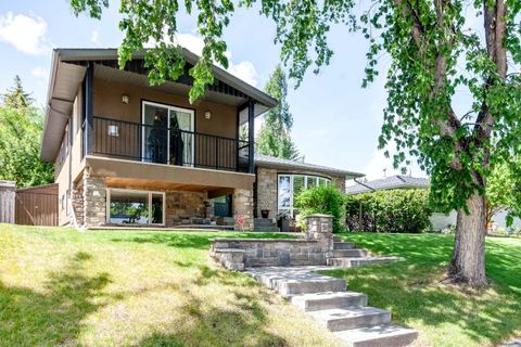 Photo of 51 Wimbledon Drive SW, Calgary, AB T3C 3J5 (MLS # A2315437)