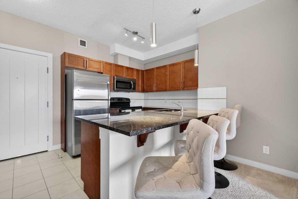 Photo of 604 East Lake Boulevard NE #2421, Airdrie, AB T4A 0G6 (MLS # A2288489)