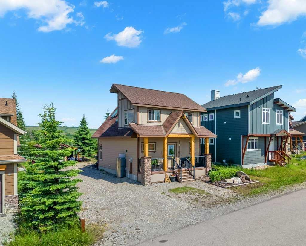 Photo of 224 Cottageclub Crescent, Rural Rocky View County, AB T4C 1B1 (MLS # A2328462)