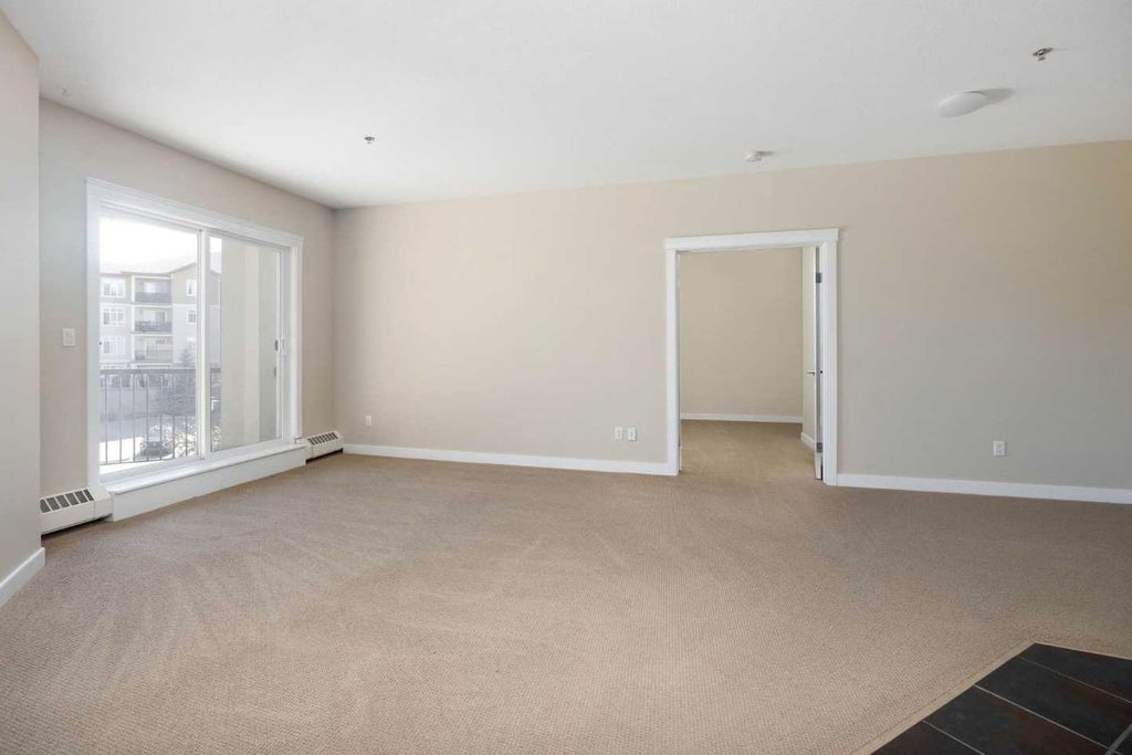 Photo of 100 Denholm Gate #205, Fort McMurray, AB T9H 0B2 (MLS # A2329266)