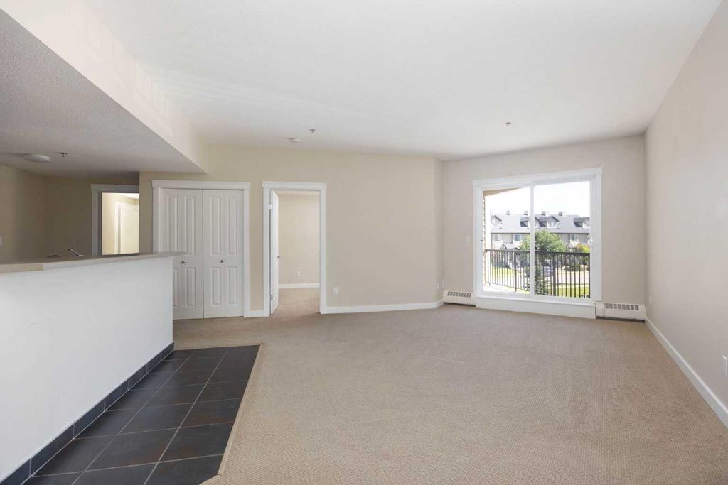 Photo of 100 Denholm Gate #205, Fort McMurray, AB T9H 0B2 (MLS # A2329266)