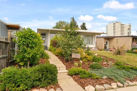 Photo of 726 68 Avenue SW, Calgary, AB T2V 0N2 (MLS # A2343421)