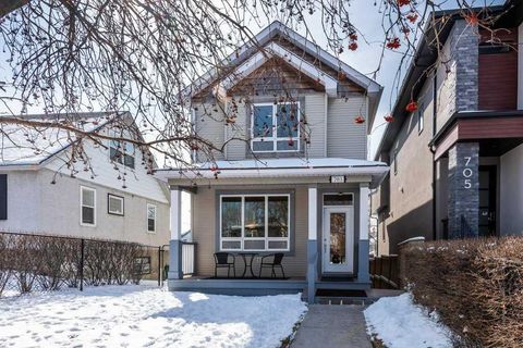 Photo of 703 52 Avenue SW, Calgary, AB T2V 0B6 (MLS # A2299270)