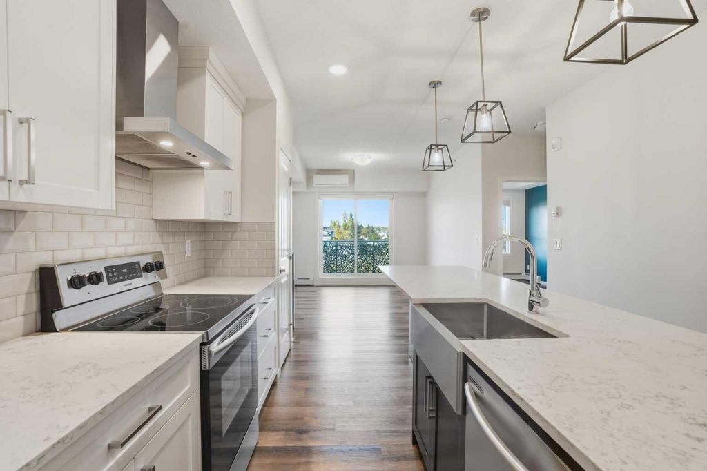 Photo of 300 Harvest Hills Place NE #413, Calgary, AB T3K 2P4 (MLS # A2287968)