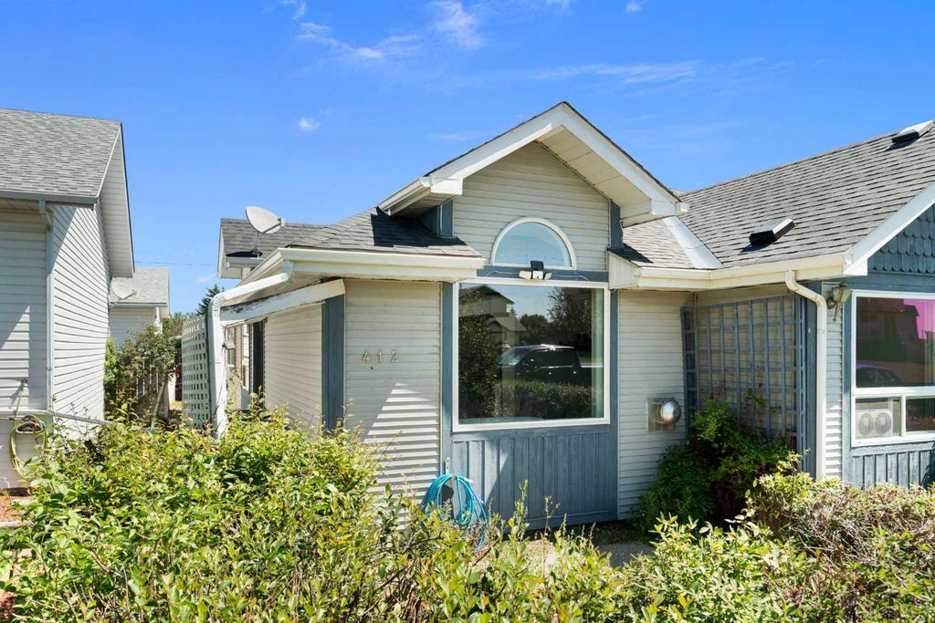 Photo of 412 9 Street, Beiseker, AB T0M 0G0 (MLS # A2326703)